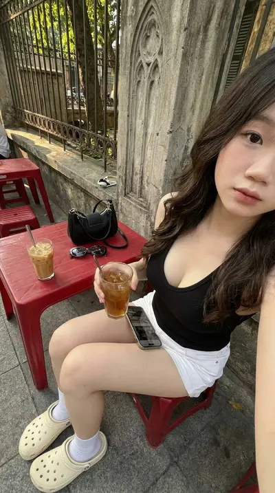 Black V-Neck Tank Top Hanoi Sidewalk Cafe Portrait Prompt — Midjourney prompt variation 8